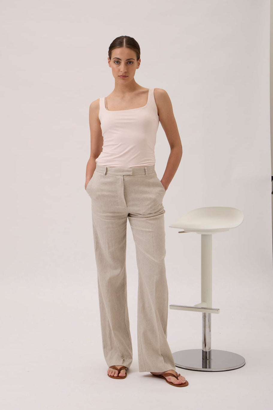 Double-layer Nilo jersey tank top in Cipria, full-length front view styled with trousers