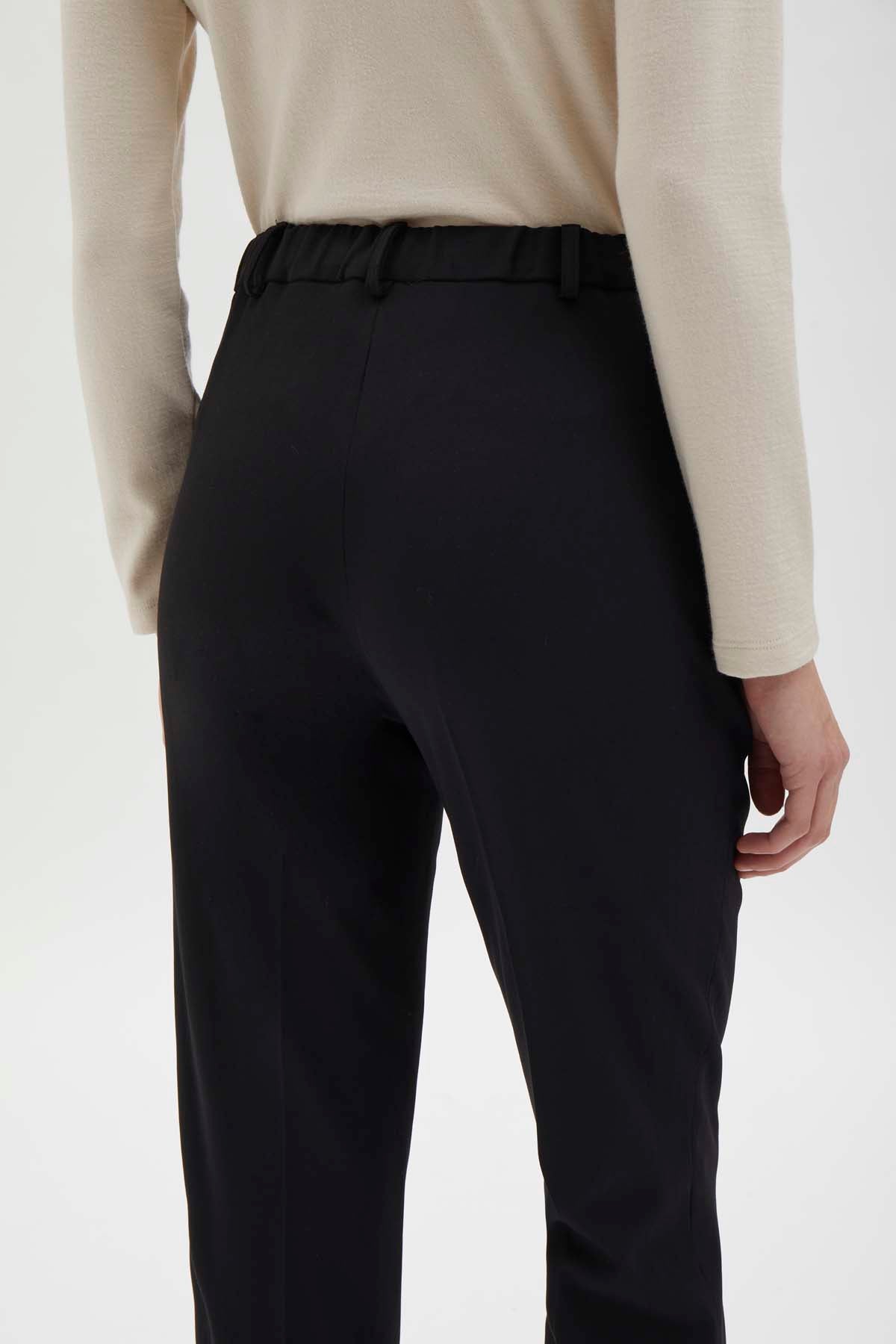 Cigarette pants with detail at waist. Black