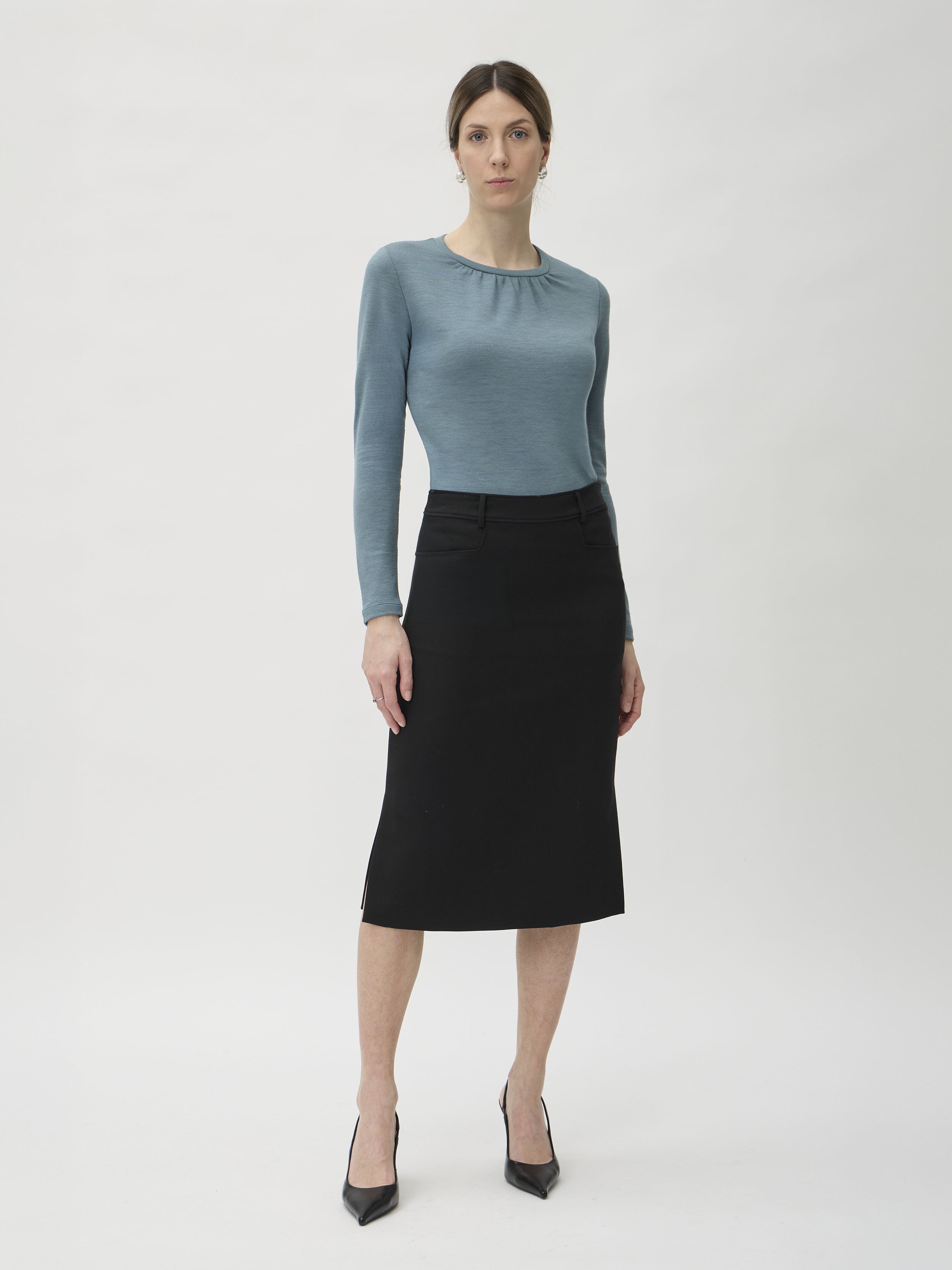louse Wrinkled Neckline in Darfo 1200 Green Blue – model full length front view styled with black midi skirt – ELISE GUG