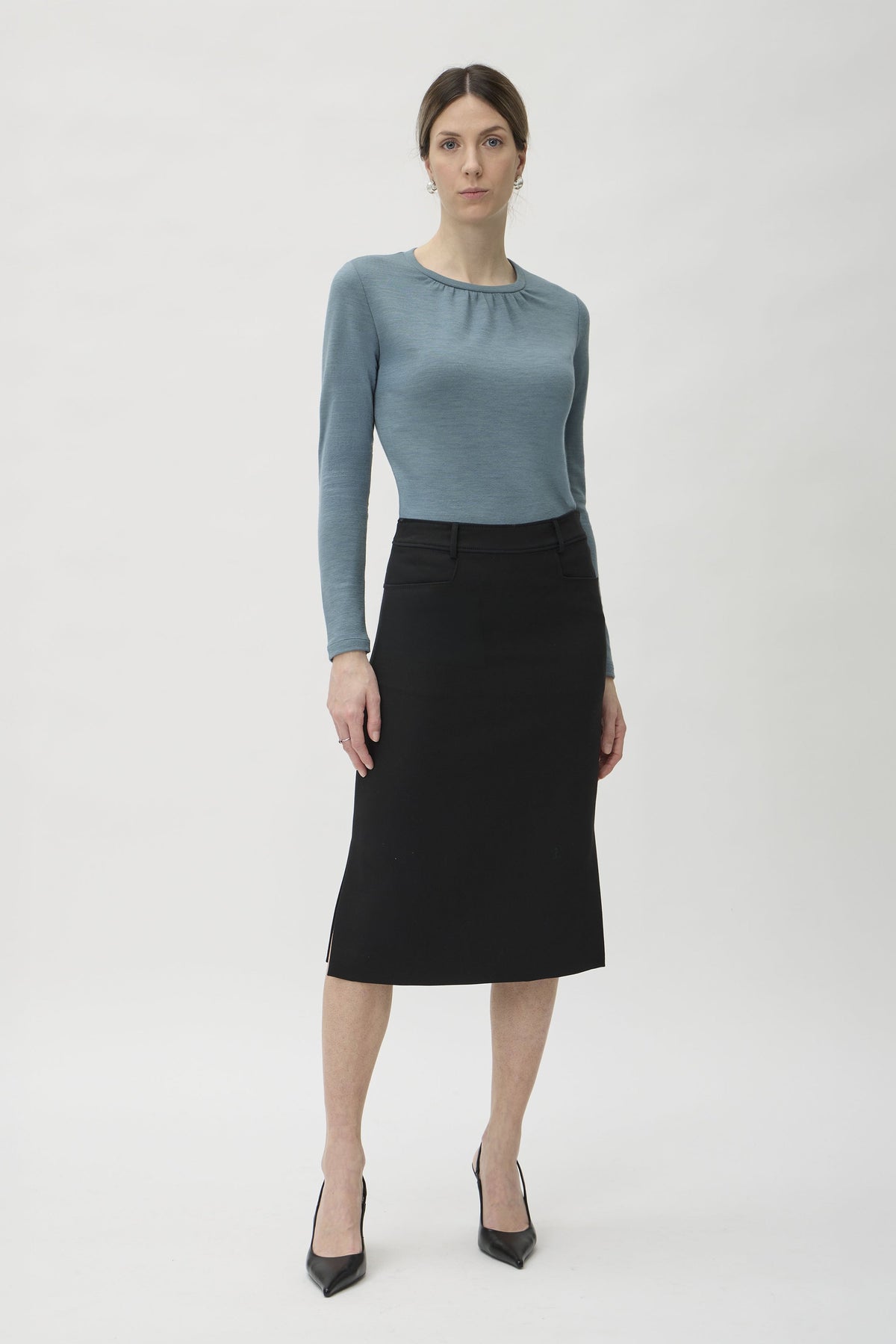 louse Wrinkled Neckline in Darfo 1200 Green Blue – model full length front view styled with black midi skirt – ELISE GUG
