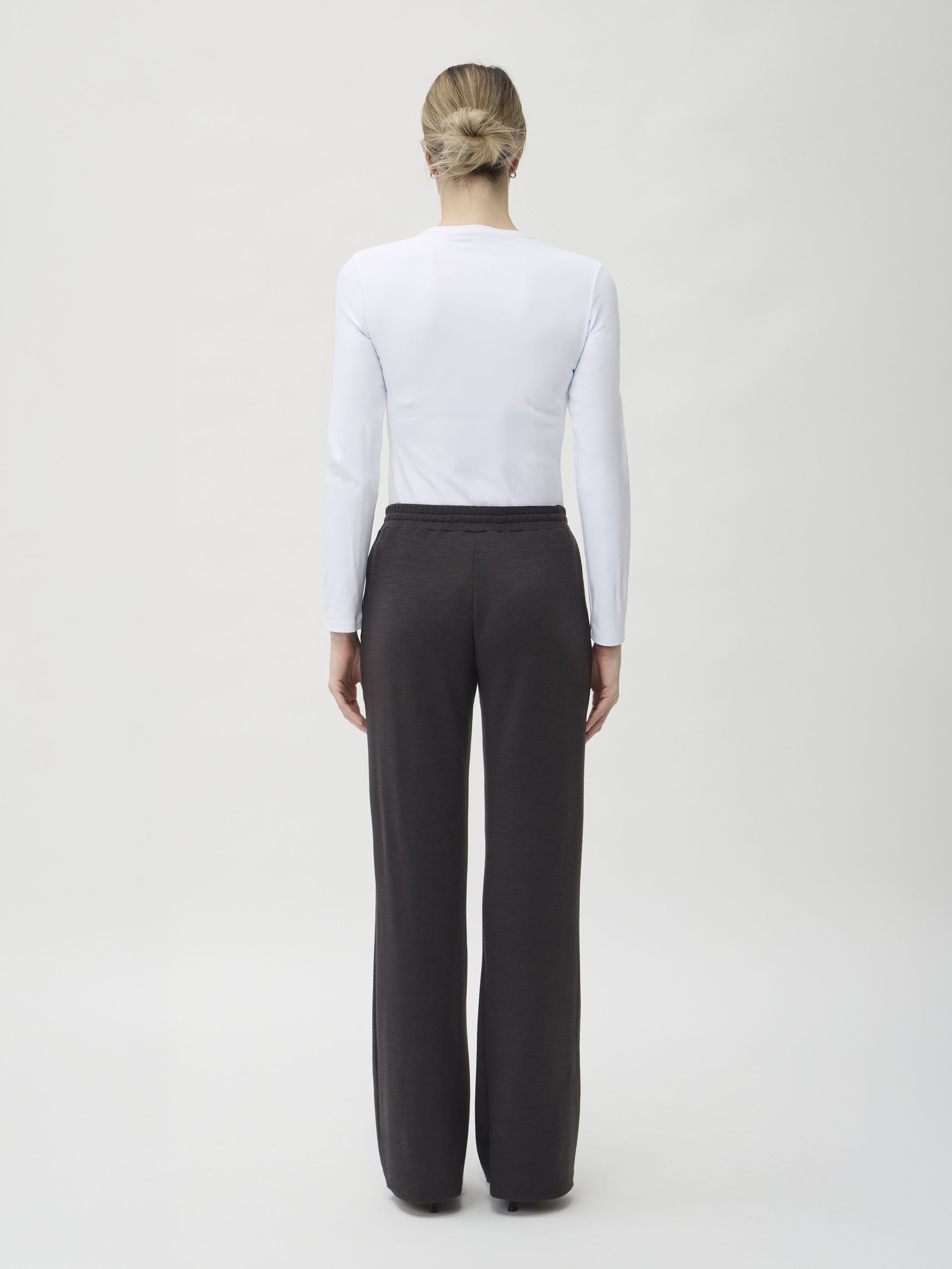 Straight-Legged Trousers in Darfo 4026 Caffe – worn by model, back view