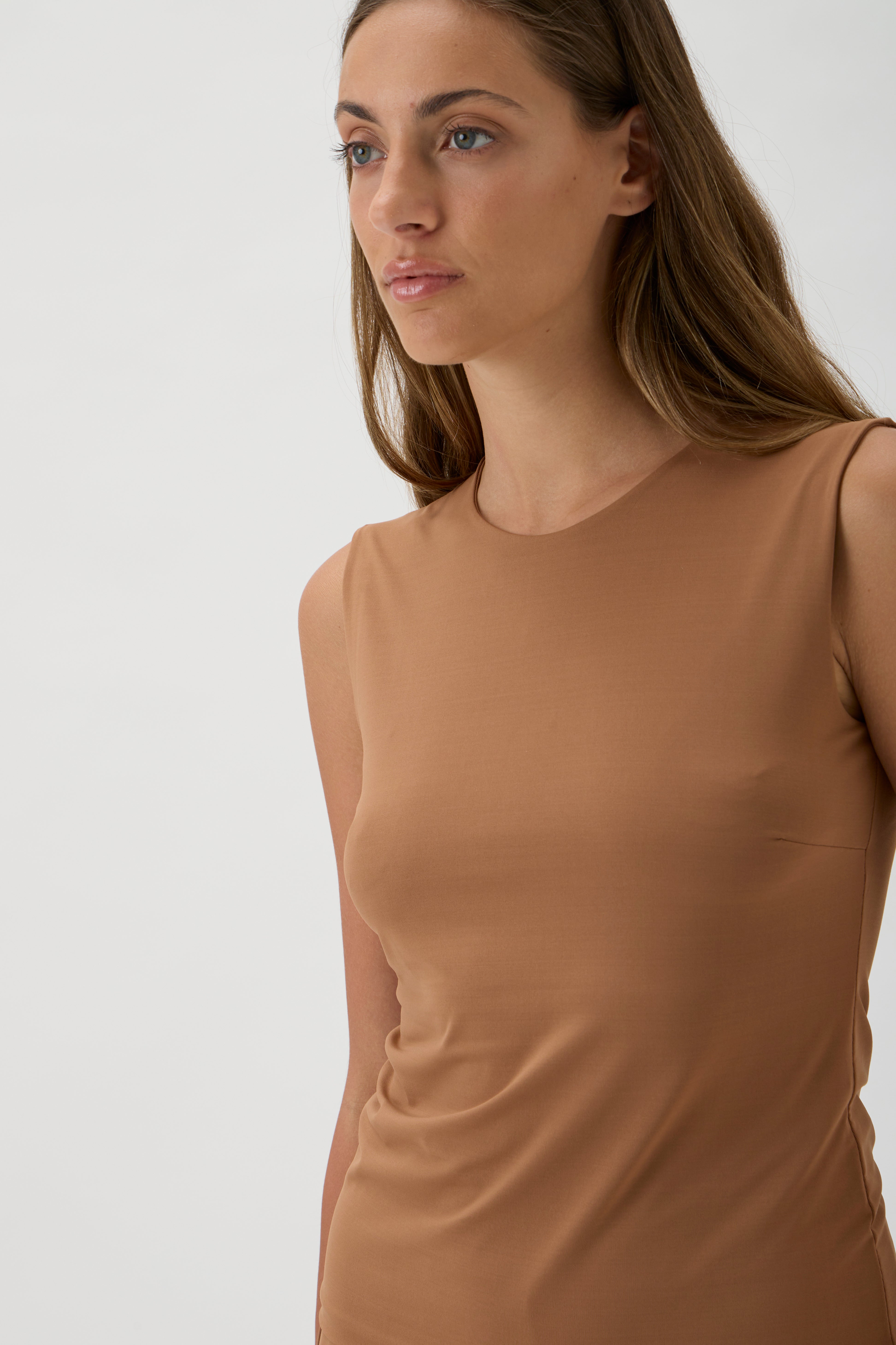 Minimalist sleeveless microfiber top with crew neck