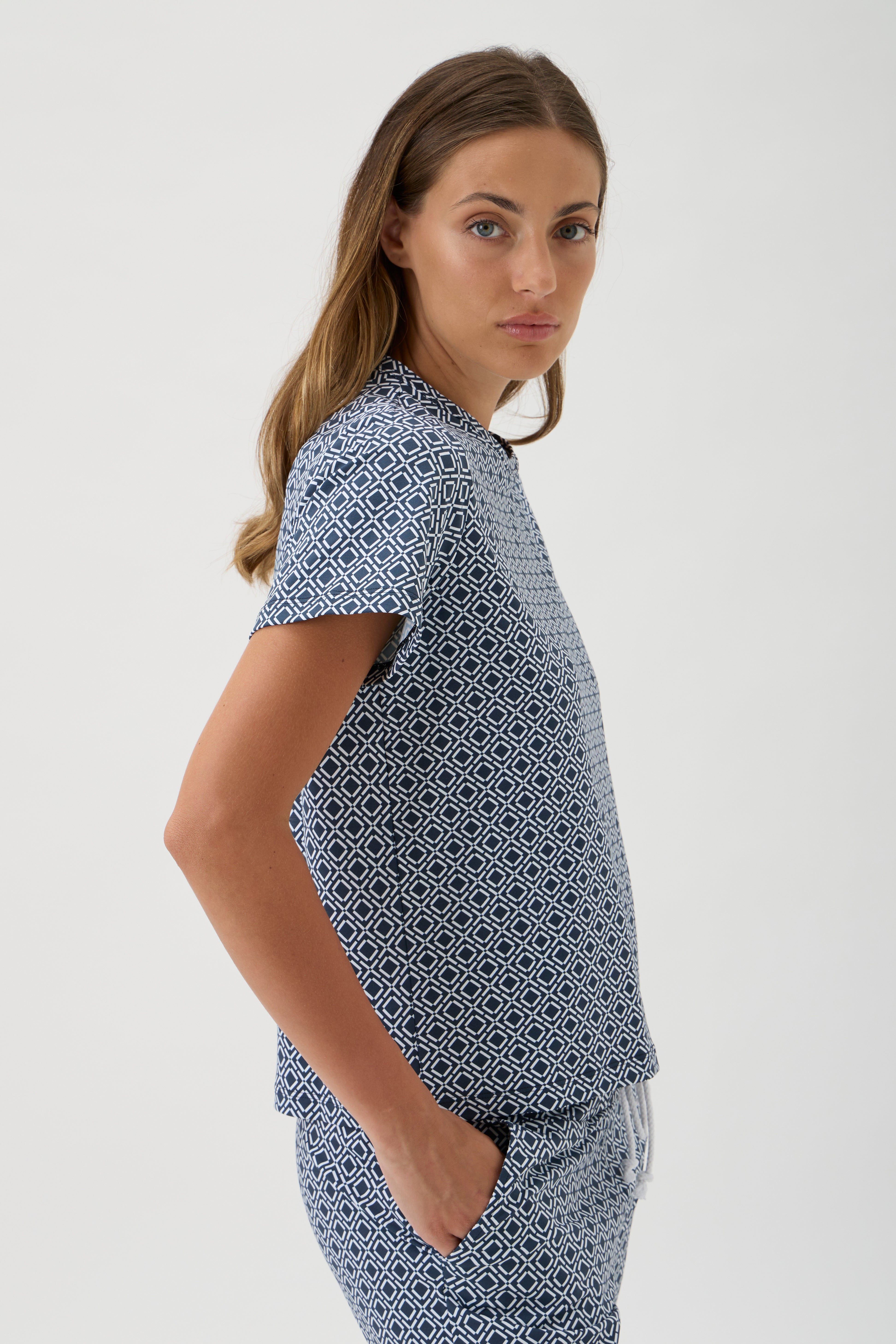 Side view of luxury geometric print T-shirt in soft NAIR jersey fabric