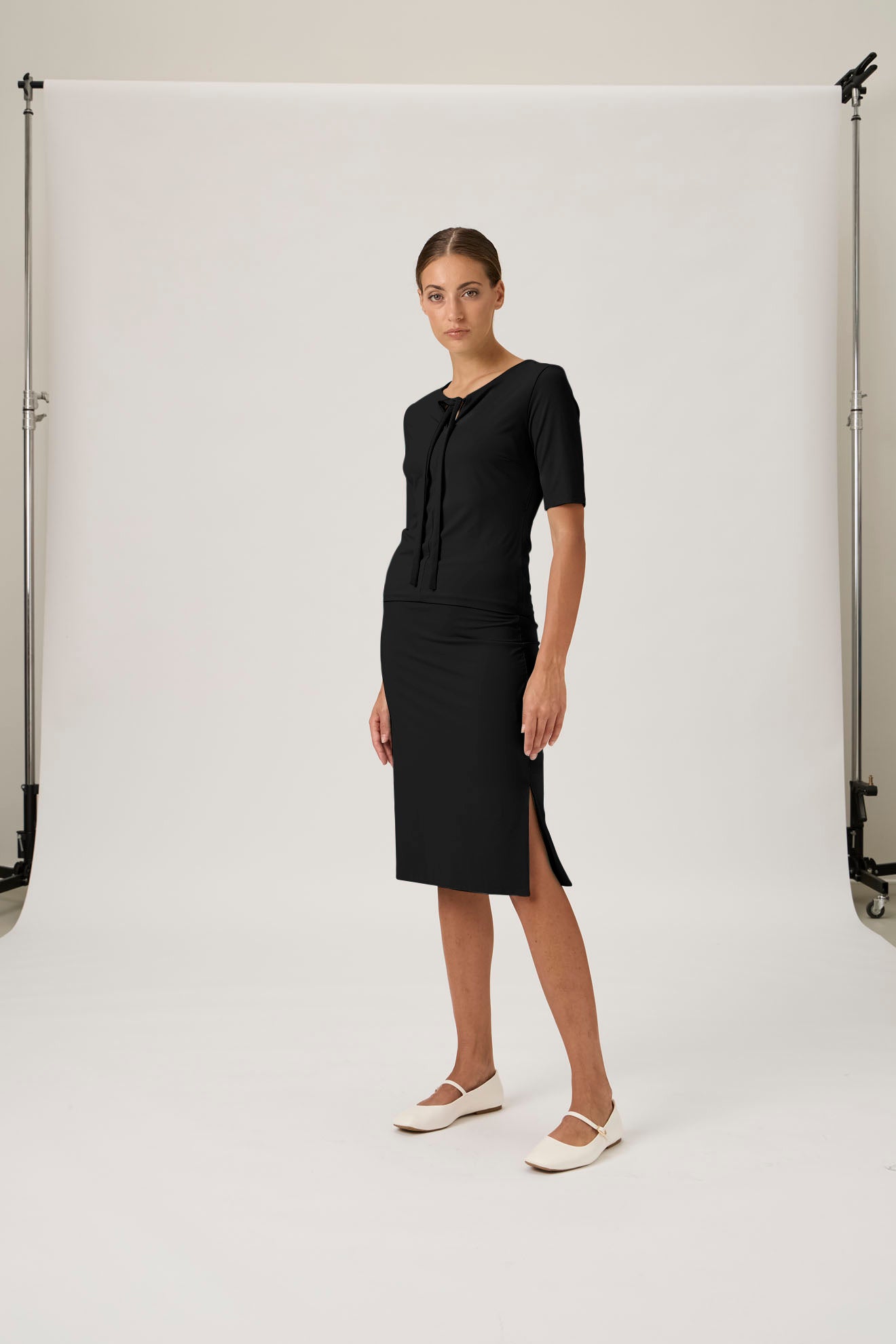 Refined Knee-Length Skirt with Subtle Slit - Black