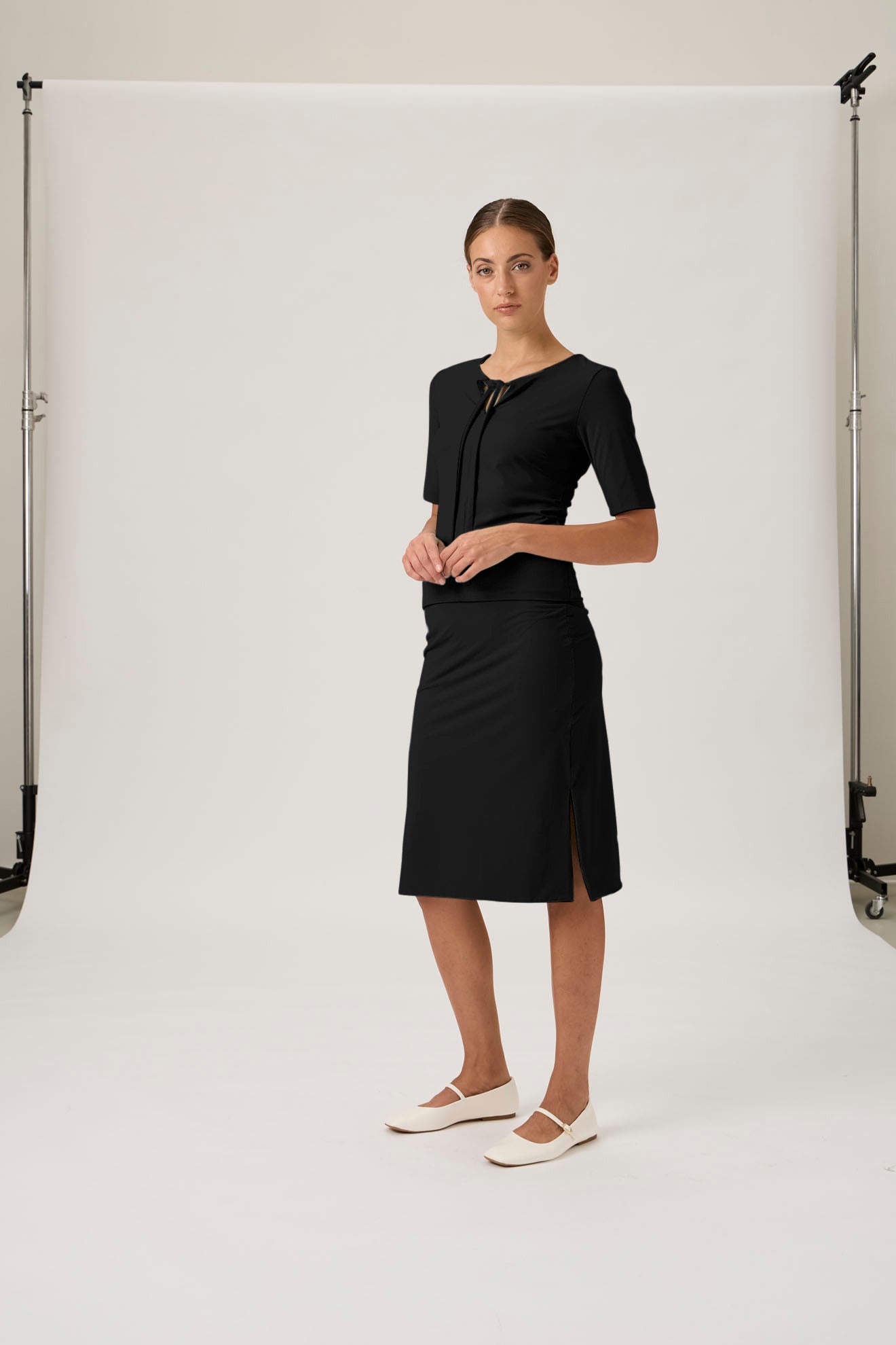 Refined Knee-Length Skirt with Subtle Slit - Black