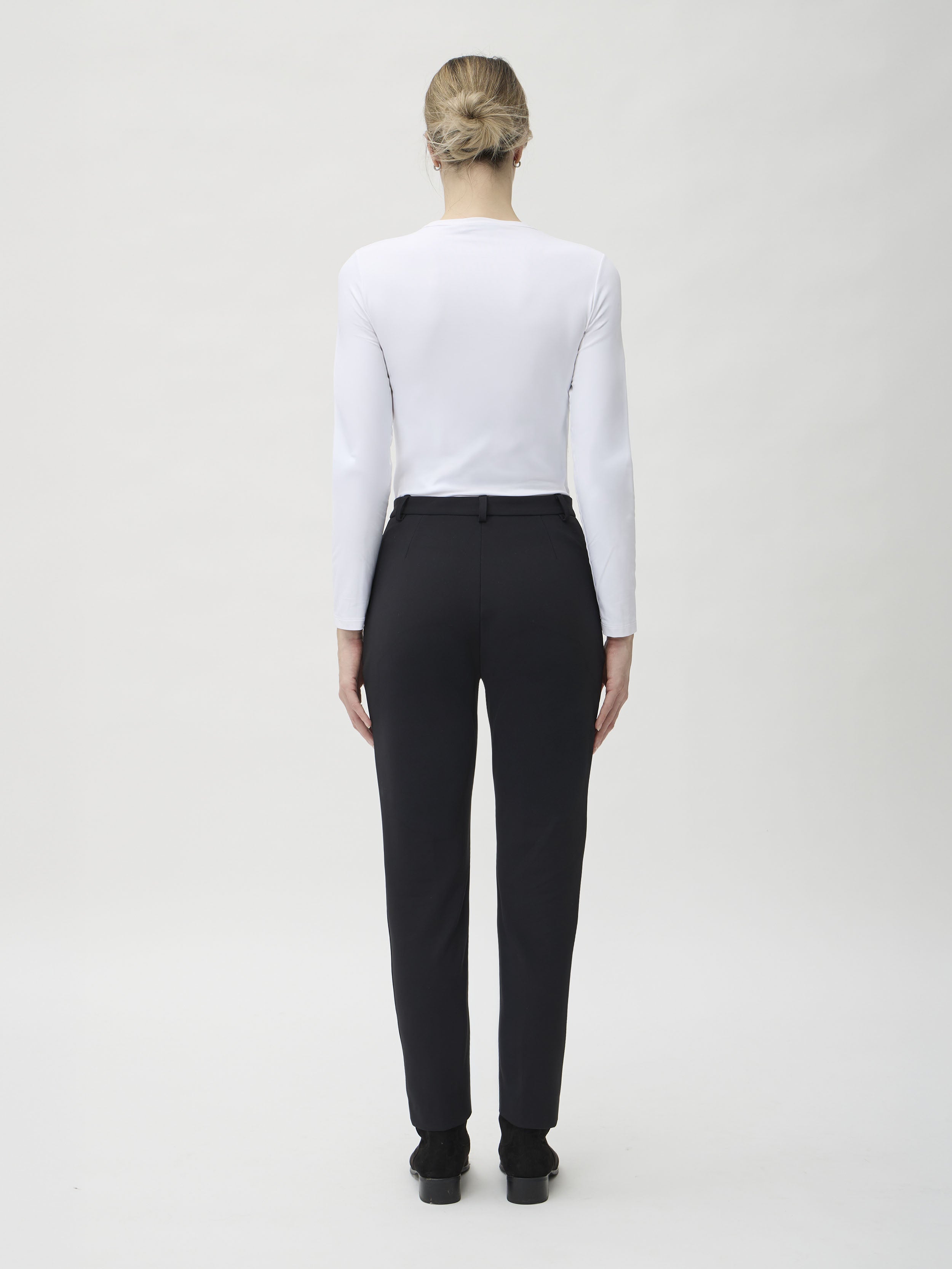 ELISE GUG black slim trousers in Aosta – back view