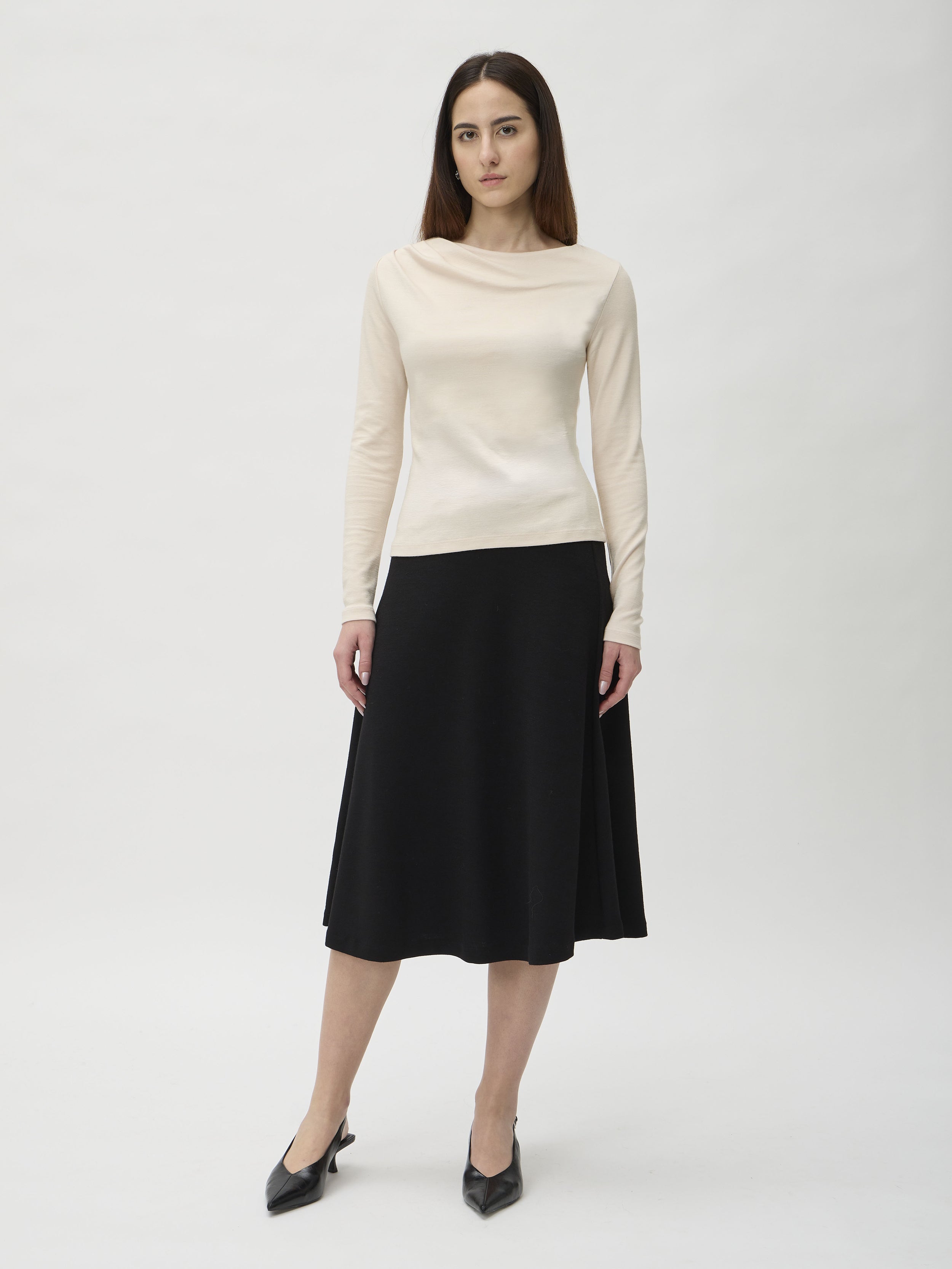 Blouse with Shoulder Pleats in Darfo 1201 Cream – model full length front view styled with black midi skirt – ELISE GUG