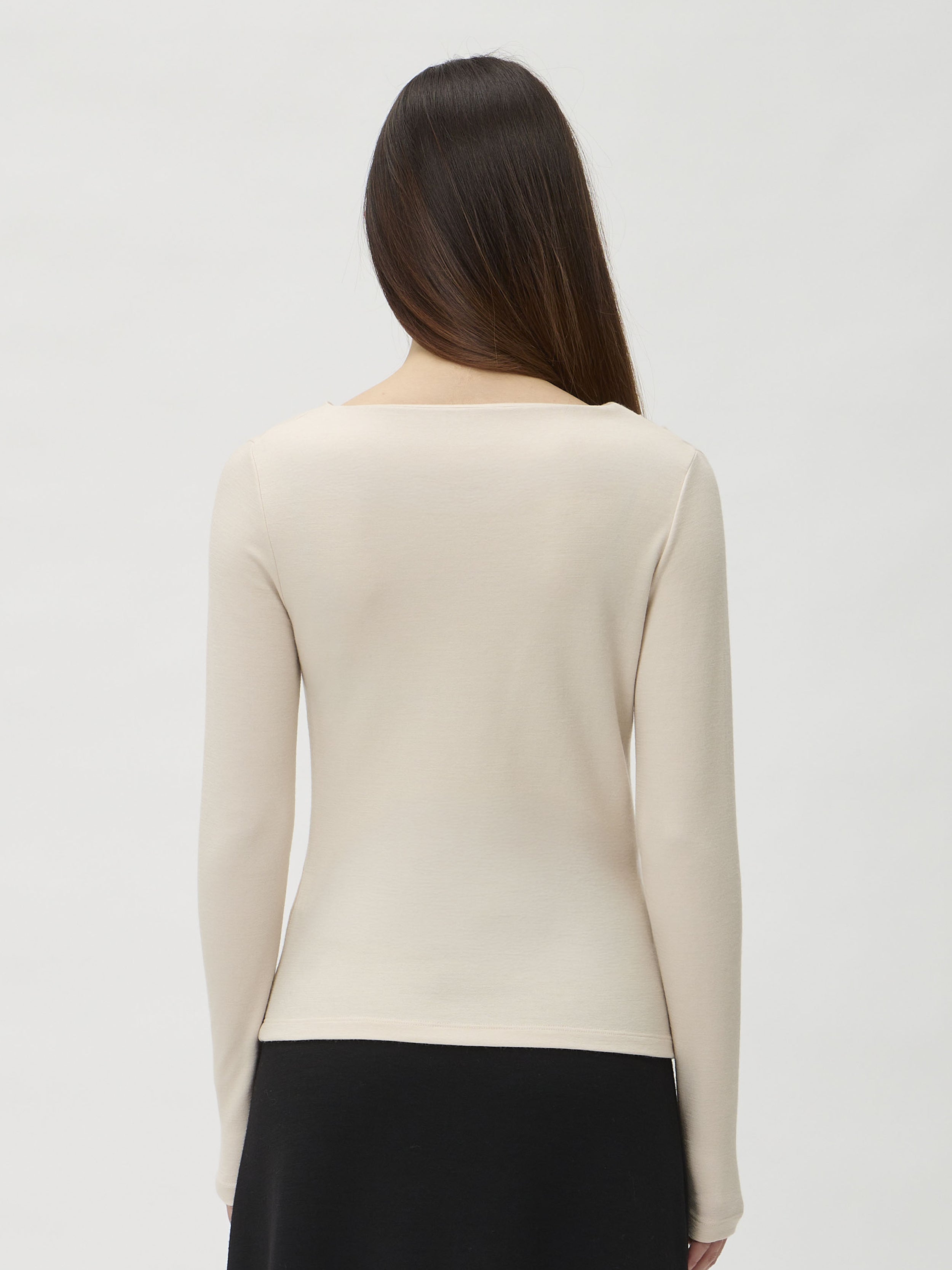 Blouse with Shoulder Pleats in Darfo 1201 Cream – model full length front view styled with black midi skirt – ELISE GUG