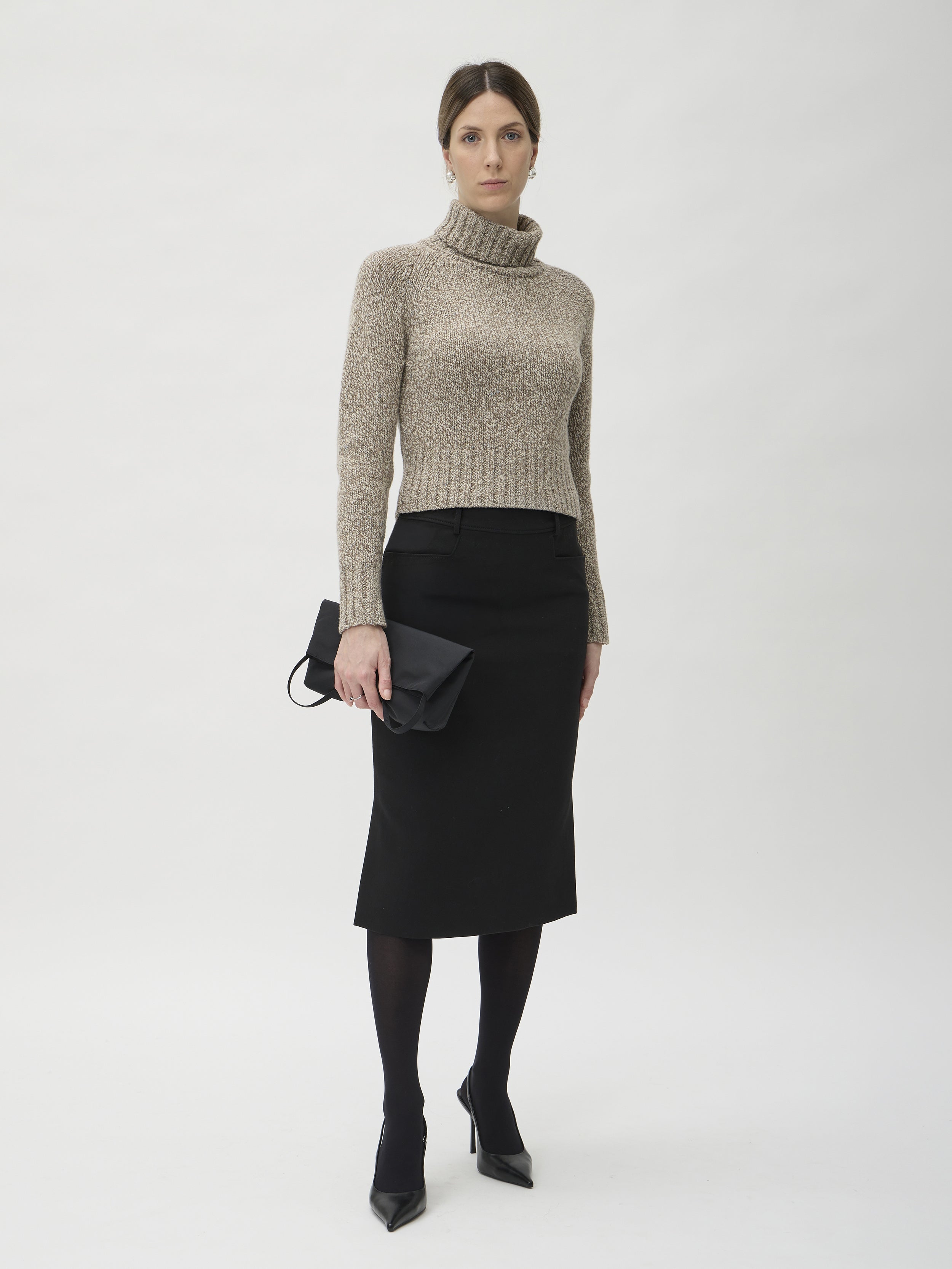 ELISE GUG Sweater with High Collar in Dixit 7083 Beige Melange – full length view styled with black midi skirt and heels
