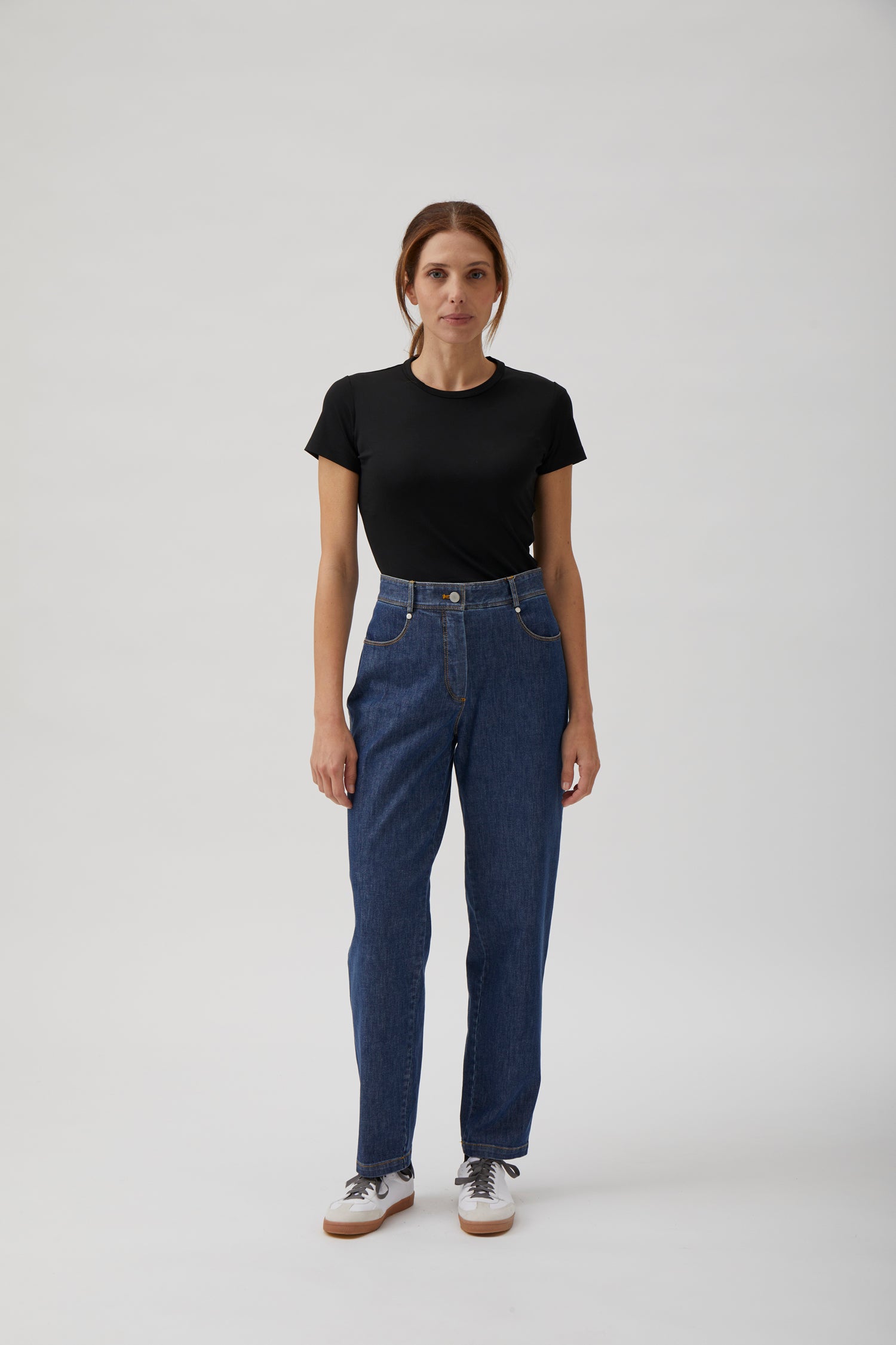 Luxury washed blue straight-leg denim jeans front view by ELISE GUG