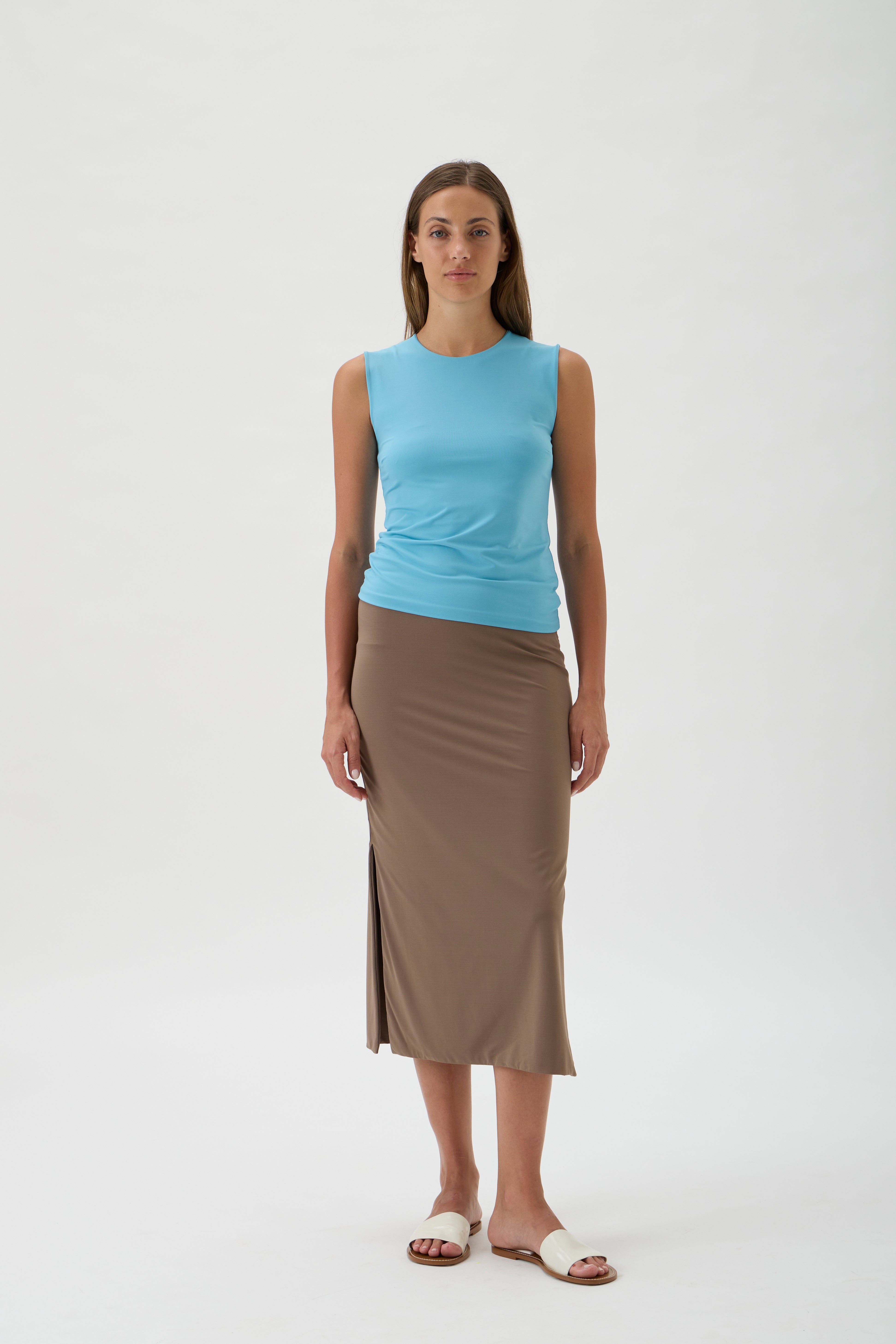 Minimalist sleeveless microfiber top with crew neck in Pool colour