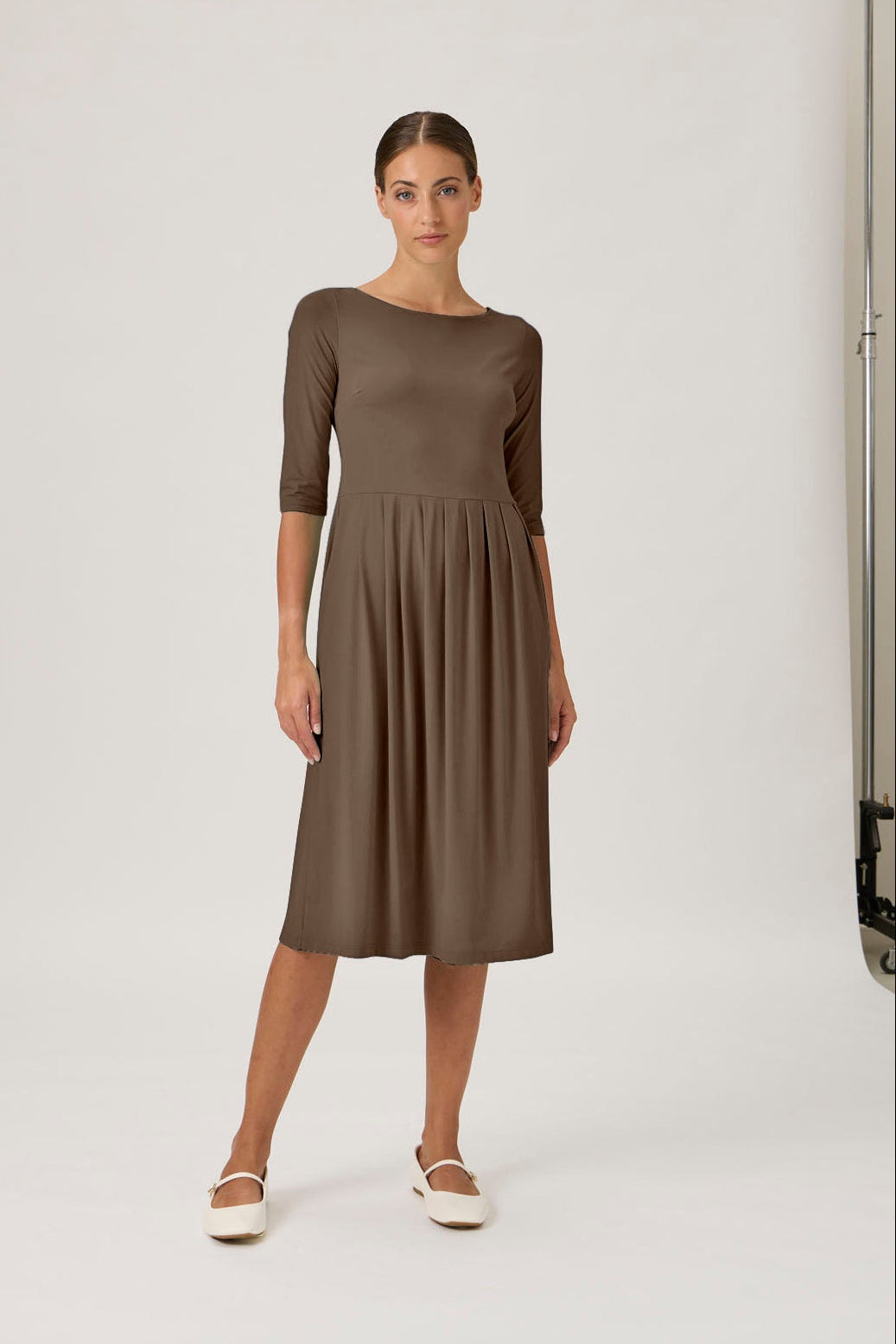Midi dress with pleated skirt in Nocciola Nilo jersey, front view with model