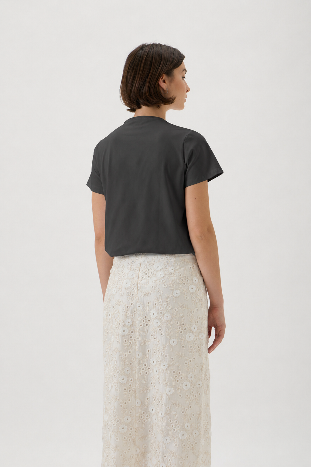 Back view of black relaxed-fit designer T-shirt in smooth stretch jersey